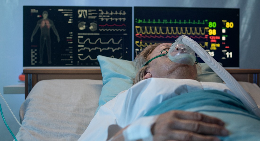 Patient in hospital bed Patient in hospital bed